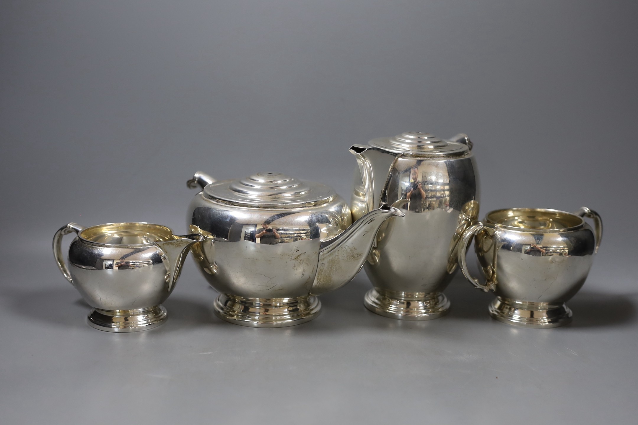 A George VI silver four piece ovoid tea set, by Frank Cobb Ltd, Sheffield, 1945, gross weight 59oz, no handles or knops.